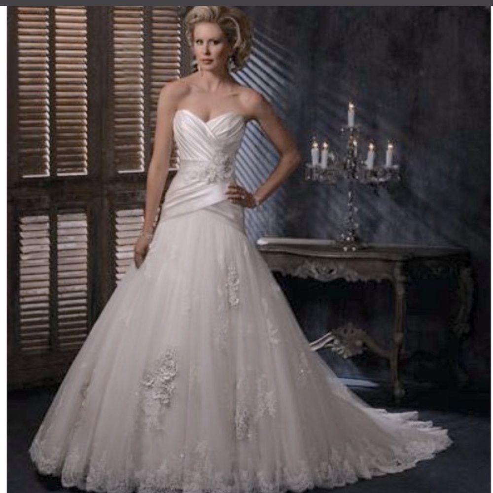 All of 4 wedding dresses for sale.